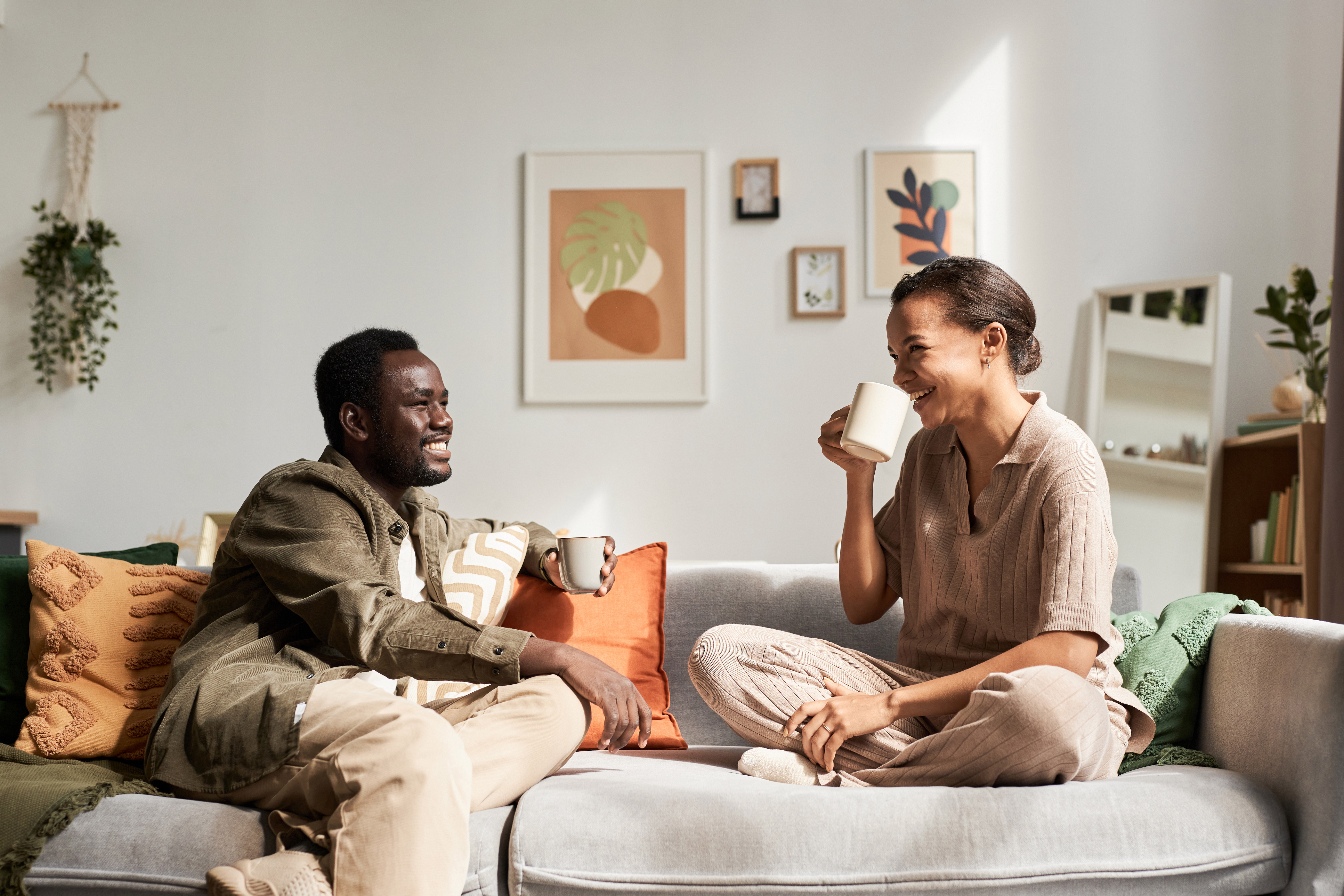 Couple chatting on sofa