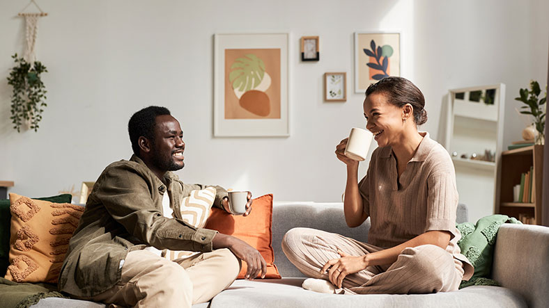 Couple Chatting on Sofa